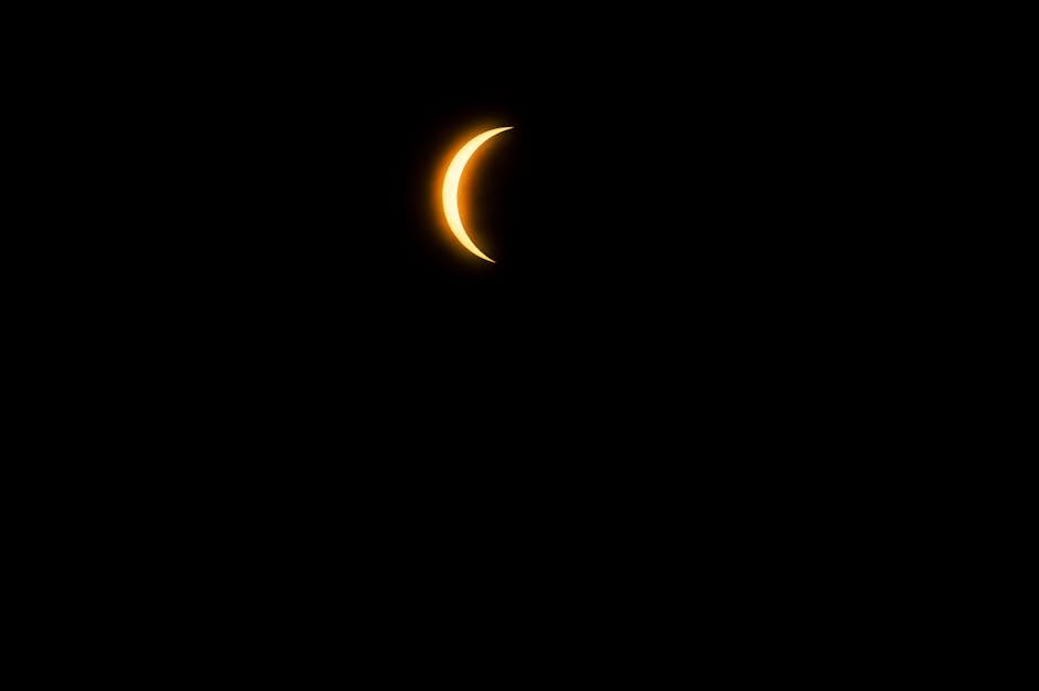 A focused image capturing a crescent solar eclipse in Mazatlán, México at night.