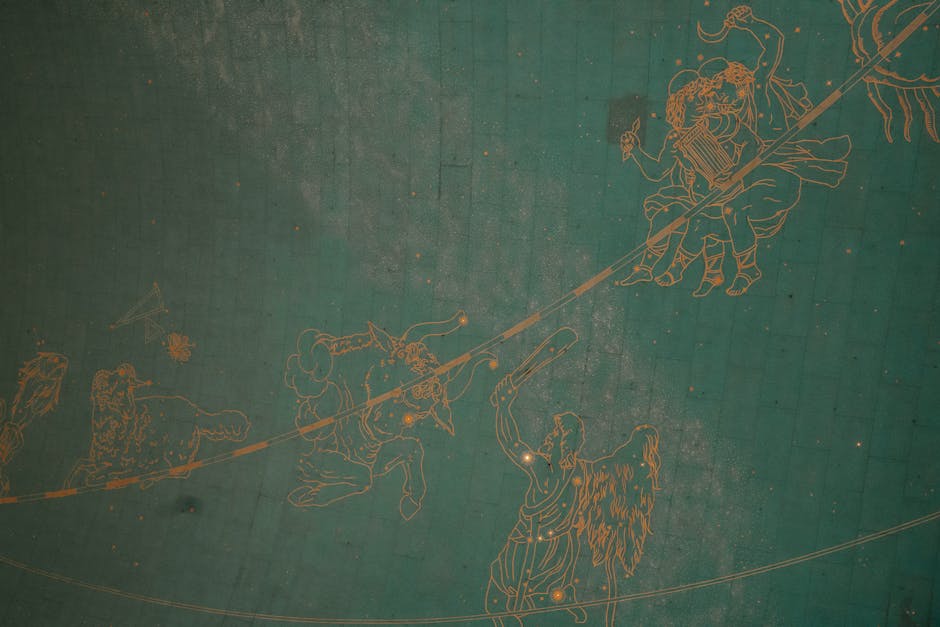 Illustration of zodiac signs on a historic astronomical ceiling, showcasing intricate details and vintage charm.