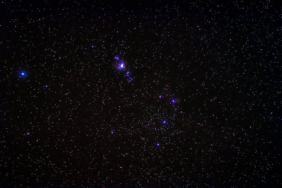 A breathtaking view of the Orion constellation amidst a star-filled night sky.