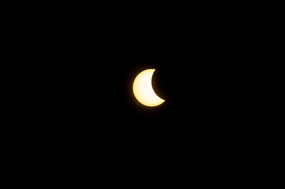 Captivating view of a partial solar eclipse captured in Mazatlán, Mexico, with a clear crescent shape.