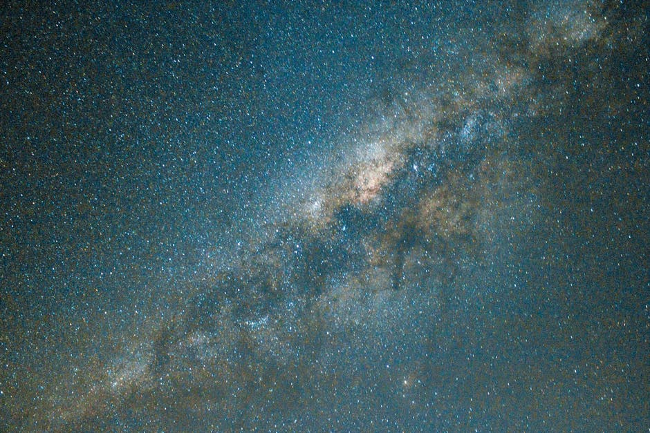 A breathtaking view of the Milky Way galaxy in a starry night sky, showcasing cosmic beauty.