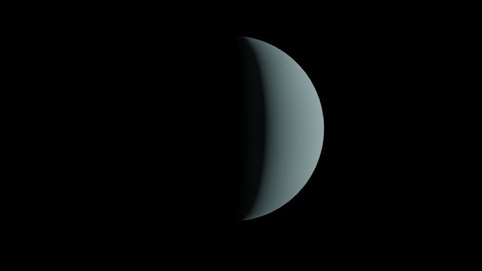 Half-lit planet resembling a crescent against a dark space backdrop.