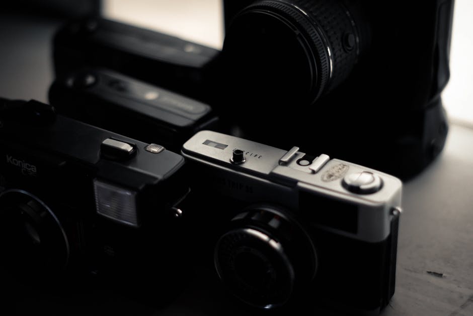 A nostalgic still life of vintage cameras symbolizing past photography styles.