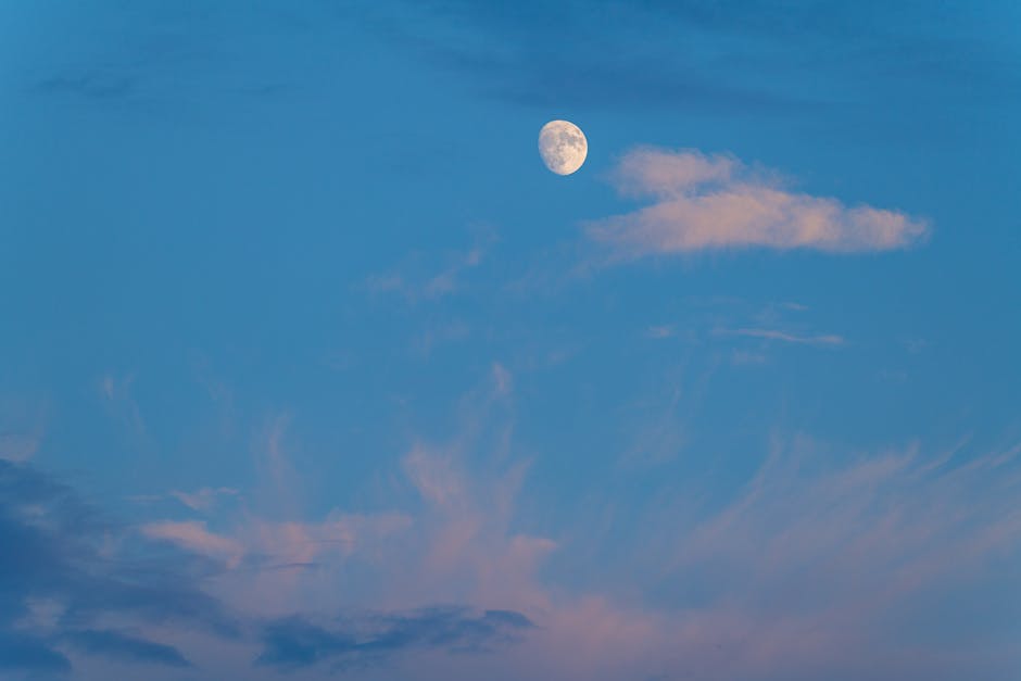 Captivating view of the moon over Canonsburg, Pennsylvania against a pastel sky at dusk.