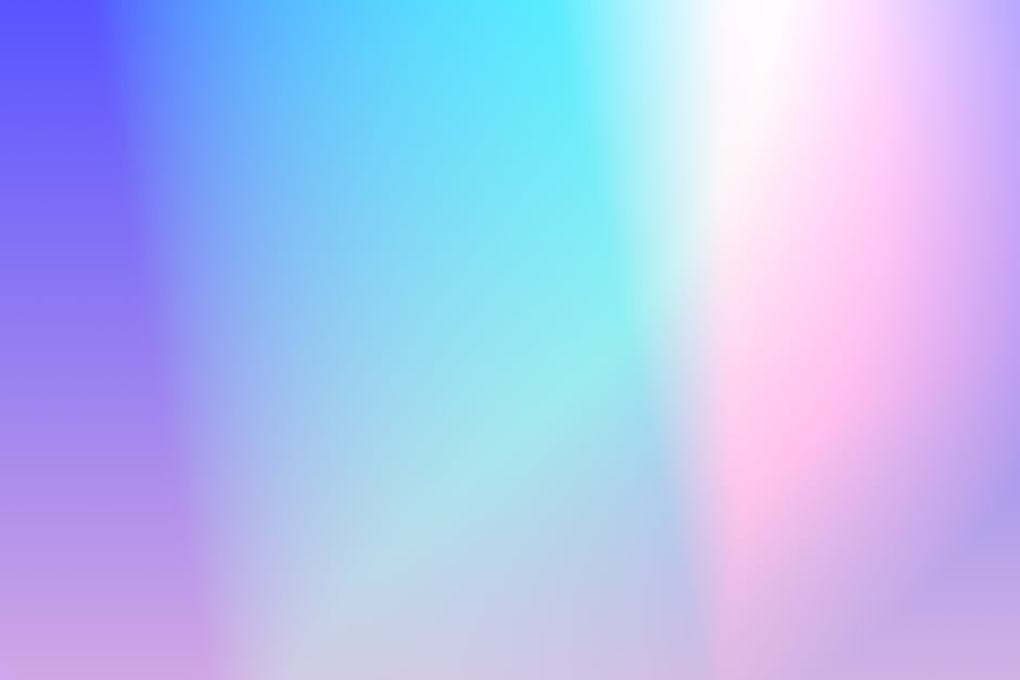 Vibrant multicolor gradient background with soft pink, purple, and blue hues.