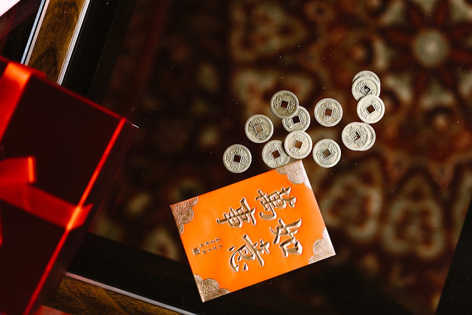 A traditional red envelope with Chinese coins, symbolizing prosperity for the New Year.