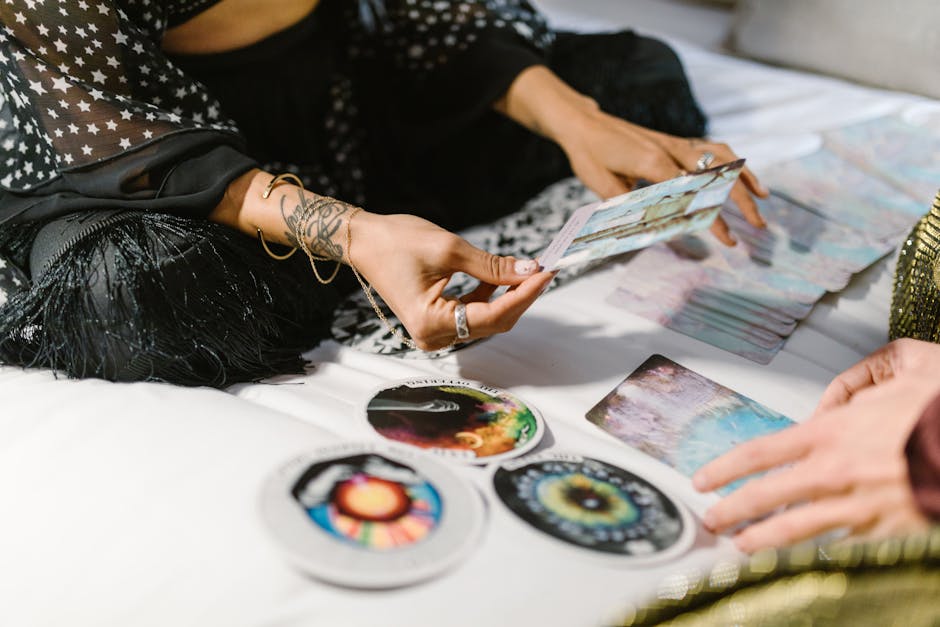 A woman performing a tarot reading with cards, conveying a mystical and spiritual atmosphere.
