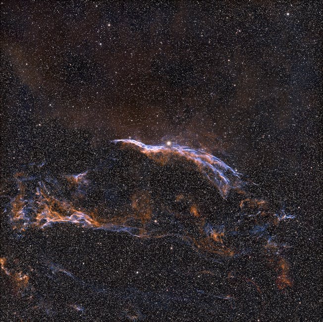 Spectacular image of the Veil Nebula showcasing intricate cosmic details and vibrant colors.