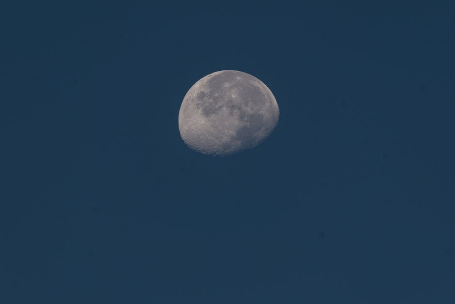 A crescent moon shining brightly against a clear night sky in İzmir, Turkey.