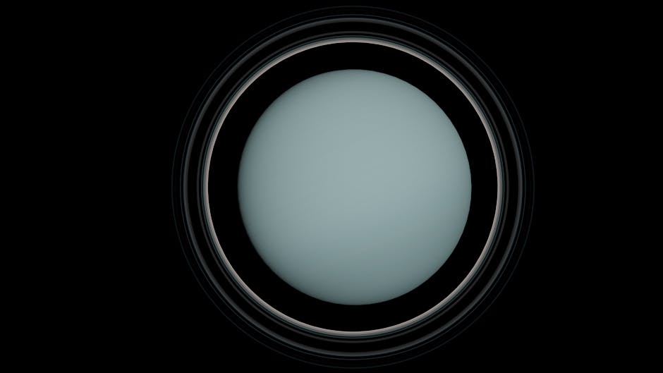 Detailed image of Uranus showcasing its rings in a dark cosmic background.