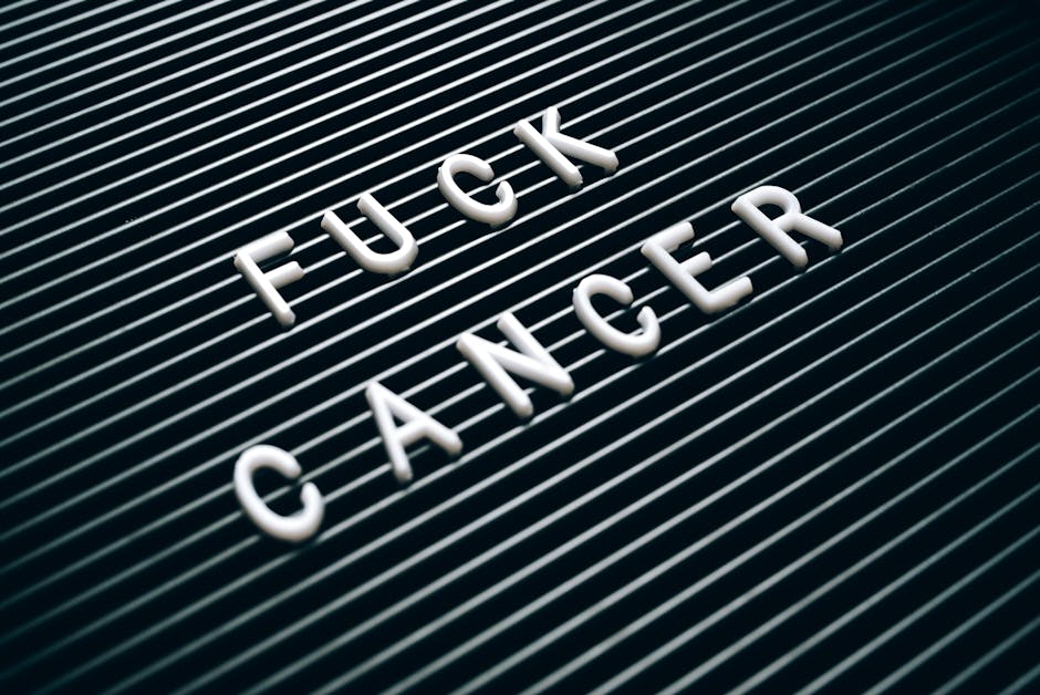 Close-up of a letter board with a strong anti-cancer message, promoting awareness.