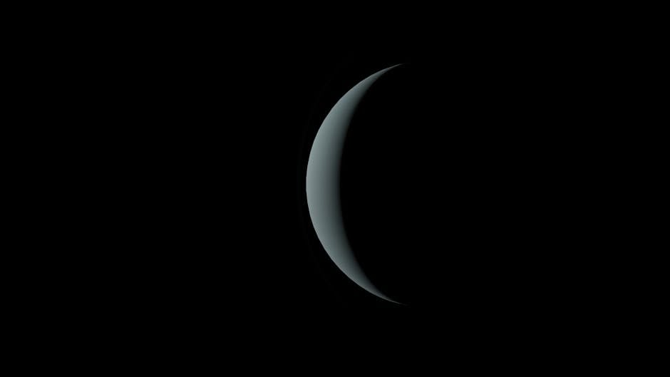 A striking image of a crescent moon set against a black sky, capturing the essence of space.