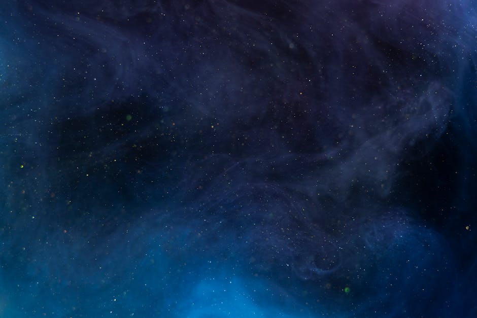 A mesmerizing view of the starry night sky with a cosmic nebula effect, enhancing the celestial ambiance.