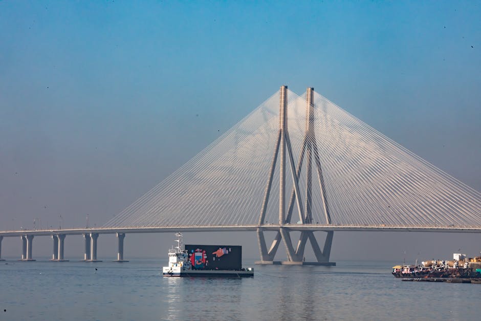 Scenic view of the Bandra-Worli Sea Link spanning the Arabian Sea under a clear blue sky.