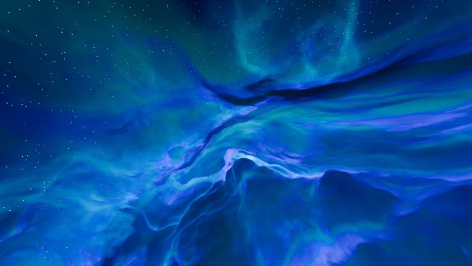 A mesmerizing deep space scene of a blue and purple nebula with stars.
