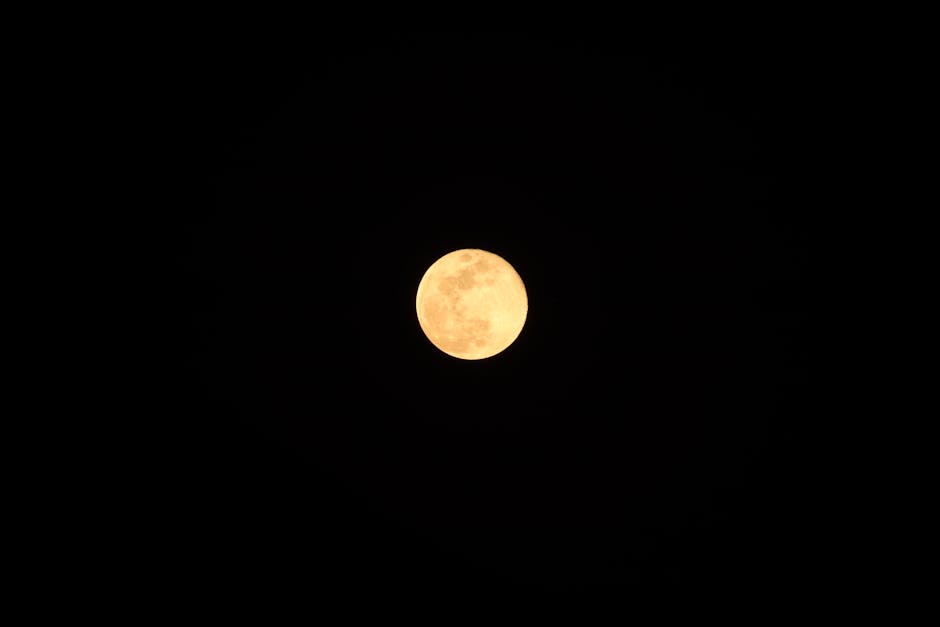 Capture of the bright full moon against a dark night sky in Okara, Pakistan.
