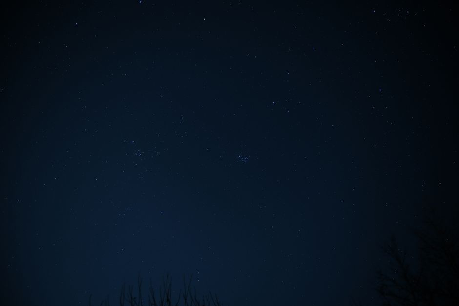 A serene view of a night sky filled with stars and constellations.